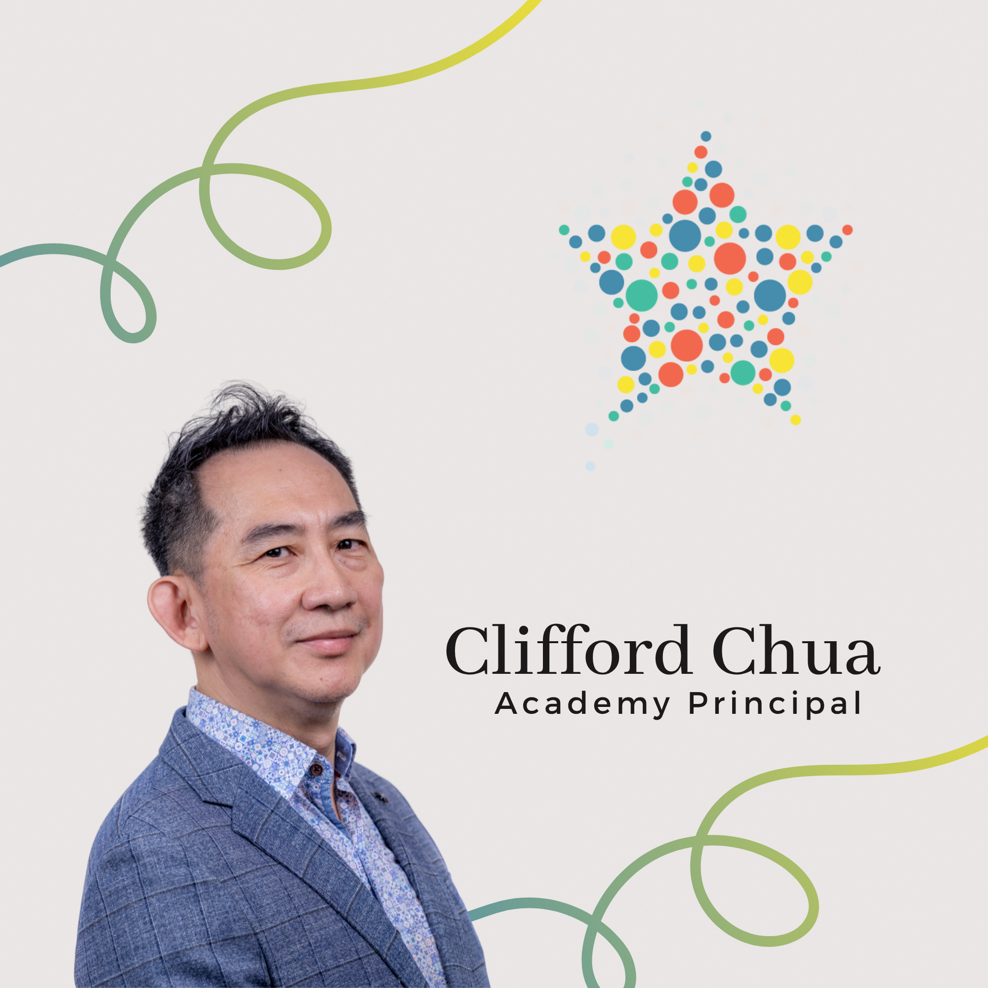 Profile photo of Clifford Chua, Academy Principal. A portrait of him smiling gently a the camera, wearing a blue blazer over a patterned shirt.